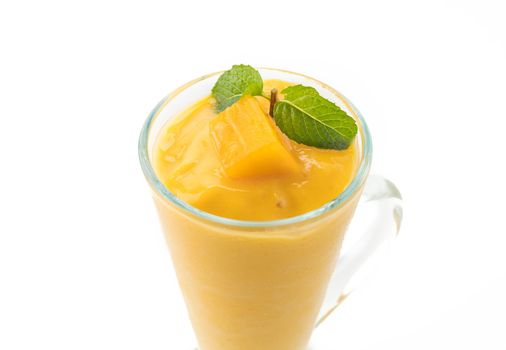 fresh mango smoothie on white background