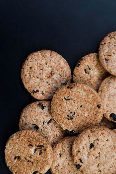 Tasty cookies isolated on dark background with copy space for your text. 