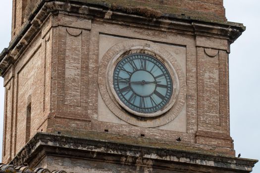 detail of the cathedral of terni bell tower with clock