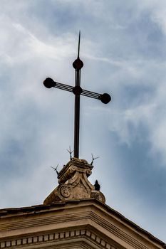 detail of the cathedral of terni crucifix at the top of the roof