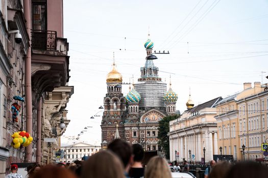 The Church of the Resurrection of Jesus Christ at St Petersburg in Russia also known as Savior-on-the-blood. Cathedral and crowd of tourists on the street