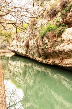 Water channel in Alcala del Jucar and vegetation