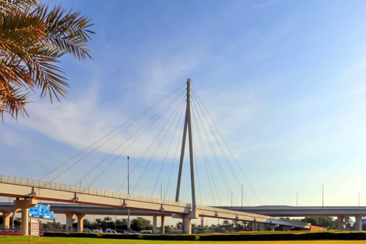 Modern bridge. United arab emirates. Dubai sunset background.