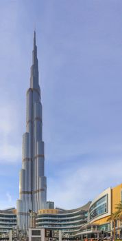 Arabic burj khalifa. Architecture building. Night dubai skyline. Dubai city background. Uae urban cityscape. Aerial view. Blue background. Panoramic view. Sky blue. United arab emirates.