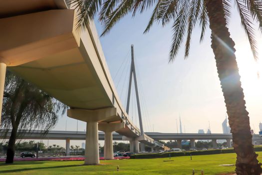Modern bridge. United arab emirates. Dubai sunset background.
