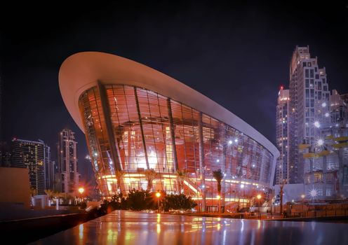 Dubai opera, great design for any purposes. Dubai marina panoramic view, skyline, cityscape. Night skyline. Holiday uae. City top view. Architecture building. Blue sky.