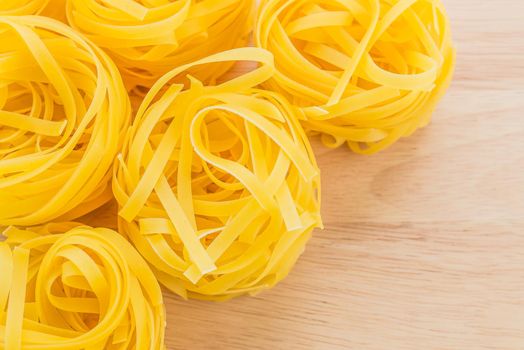 Pasta on wooden background