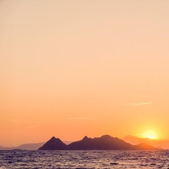 Nature, twilight and vintage beach holiday concept - Summer sunset at the Mediterranean sea coast, seascape and mountain view