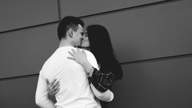Couple kissing in the city - Black and white photography - love concept