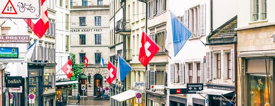 Zurich, Switzerland circa June 2021: Shopping streets and historic Old Town buildings, shops and luxury stores near main downtown Bahnhofstrasse street, Swiss architecture and travel destination