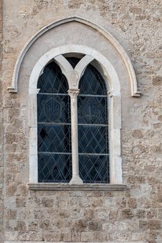 detail of the church of san francesco di terni window in the facade