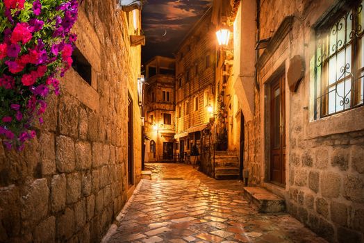 Illuminated street in Old Town of Kotor at night