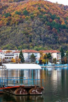 View of Danube river and Orsova city vegetation and buildings, waterfront view. Orsova, Romania, 2021