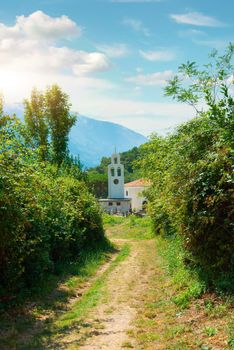 Back yard of church in Prcanj at sunset