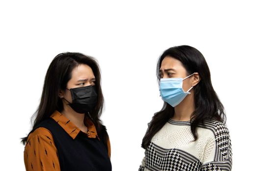 Asian pretty women wearing mask respiratory protection mask against epidemic flu covid19 or corona virus influenza in office with fear emotion in concept illness, outbreak, healthcare in life
