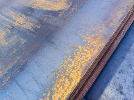 stack of rusted sheet metal - close-up with selective focus.