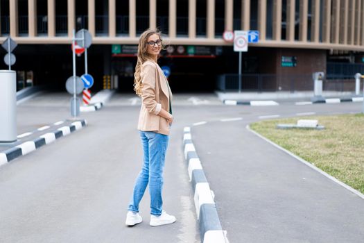 Business Woman Standing Near Indoor Parking Garage Caucasian Female Middle Age Woman in Glasses Outdoors Business Person
