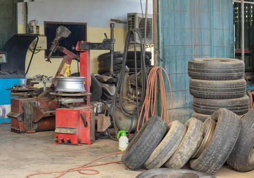 Tire changer and other equipment in a garage