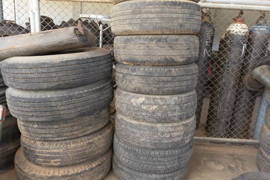 Old car tires. Concept. Danger of traveling by car.