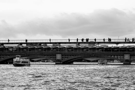 People crossing the Thames River using the Blackfrairs , London, UK.