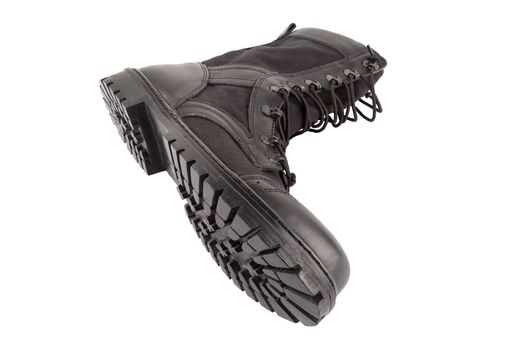 new black summertime lightweight military boot with nylon parts isolated on white background.