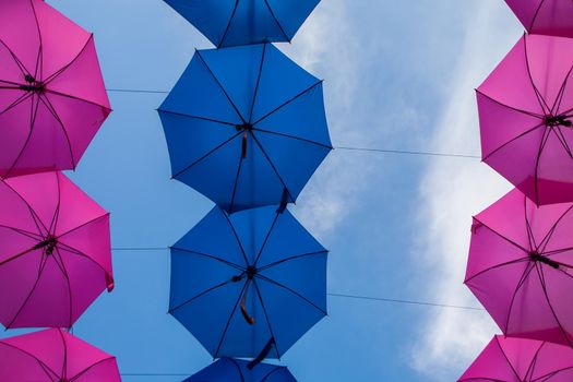 Different colours hanging umbrellas on Porcijunkulovo 2019