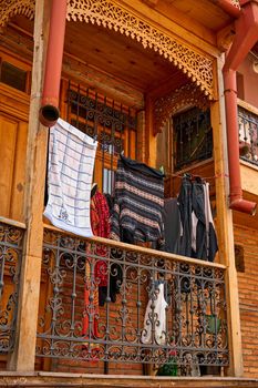 Household traditions in Georgia. The washed laundry is dried on the balcony outside.