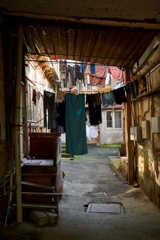 Household traditions in Georgia. The washed laundry is dried on the balcony outside.