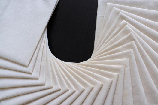 White Fabric folded of stacked . Fabric texture background