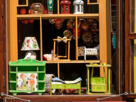 Open window with wooden products for sale on the flee market. Spancirfest 2019, Varazdin, Croatia