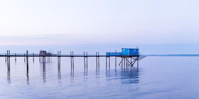 Hut of fishermen in blue sunset in Yves bay, France