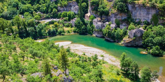 Small troglodytic french village of Castelbouc in the Gorges du Tarn, Occitanie, France