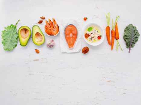 Ketogenic low carbs diet concept. Ingredients for healthy foods selection set up on white wooden background.