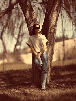 Fashion woman outdoor in spring scenery