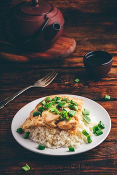 Japanese dish. Rice with scrambled eggs, chicken and green onion