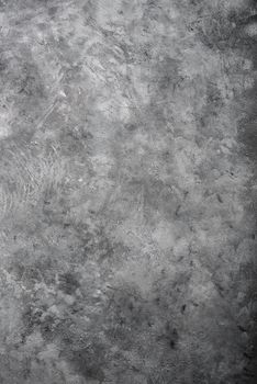 Gray textured concrete wall background. Copy space