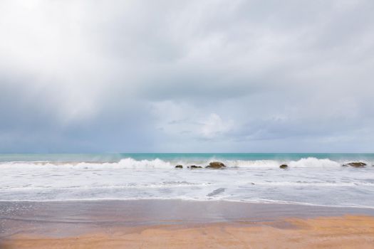 Empty beach and wave of the sea in Brittany, France