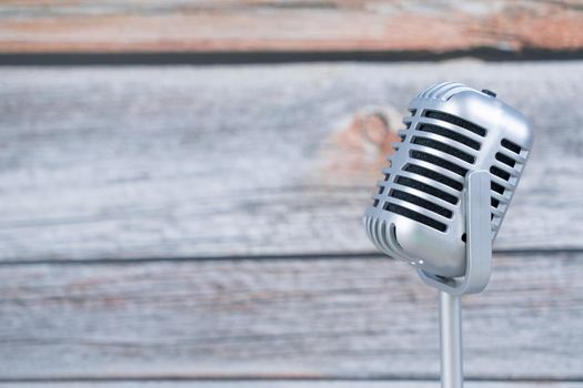 Microphone retro on wooden background