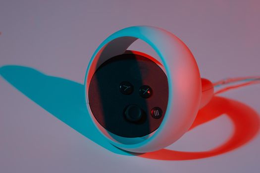 Virtual reality controllers for online and cloud gaming on white background in neon light. VR, future, gadgets, technology concept.