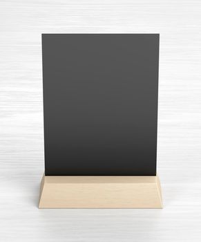 Blank menu holder on wooden table