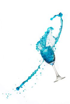 Wine glass on white background whit a blue water splash.