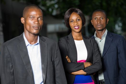 Modern team outdoors. Portrait of businessmen and businesswoman
